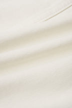 Chaqueta beige cropped con botones