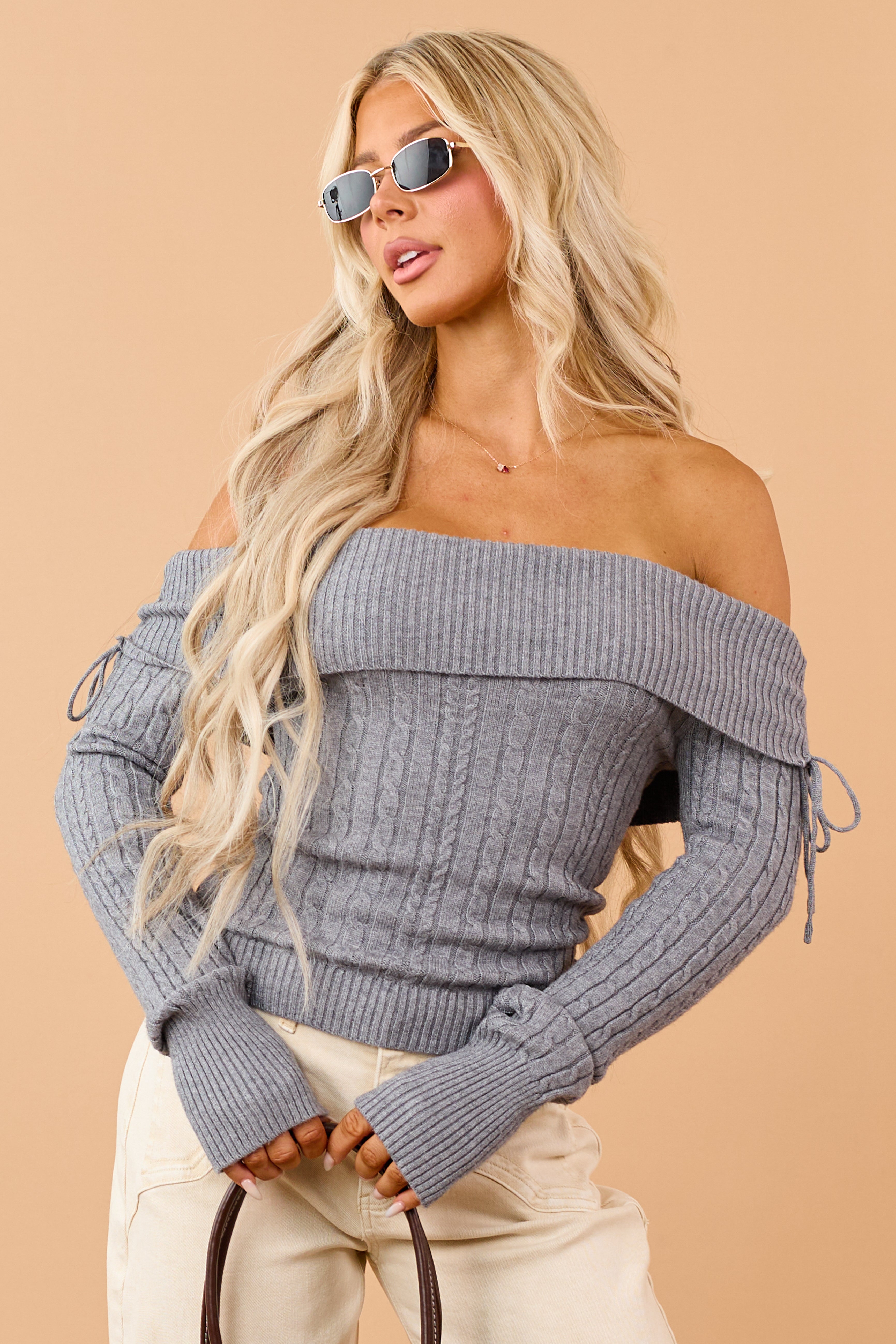 Jersey gris de punto trenzado