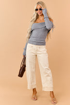 Jersey gris de punto trenzado
